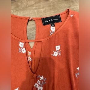 Orange bell sleeve blouse